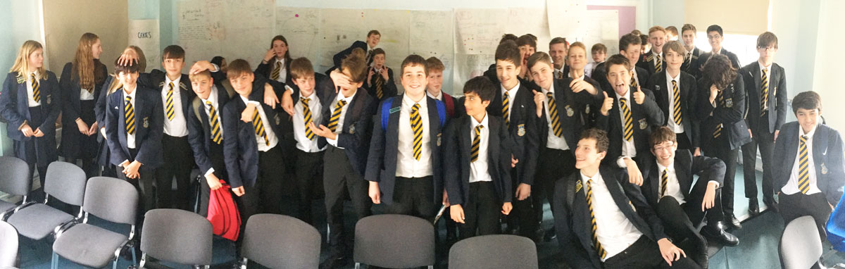A group of young potential entrepreneurs take a class about entrepreneurship