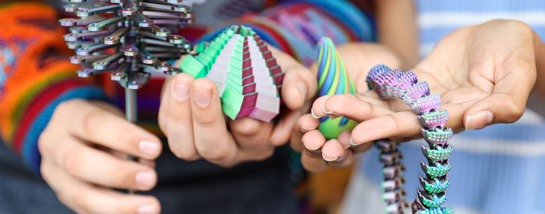 Close-up-of-young-entrepreneurs-3d-printed-fidgets