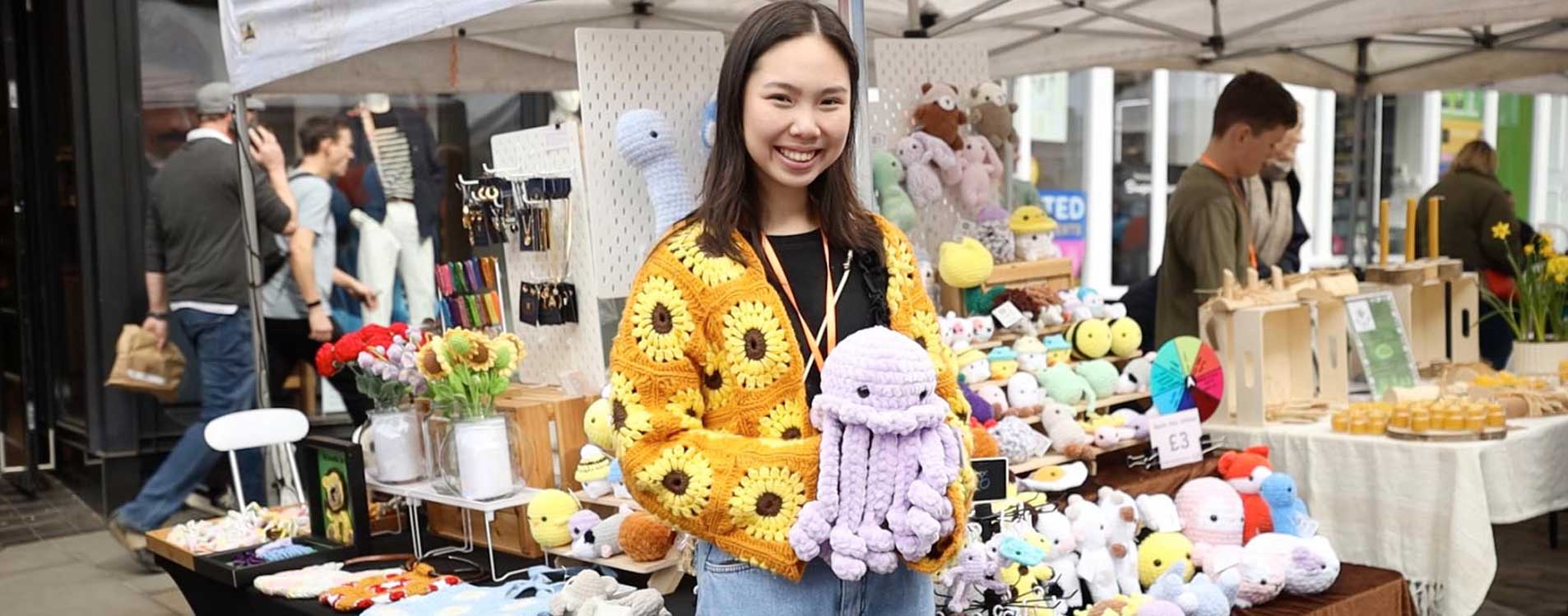 Young-entrepreneur-with-her-crochet-at-the-Young-Business-Showcase