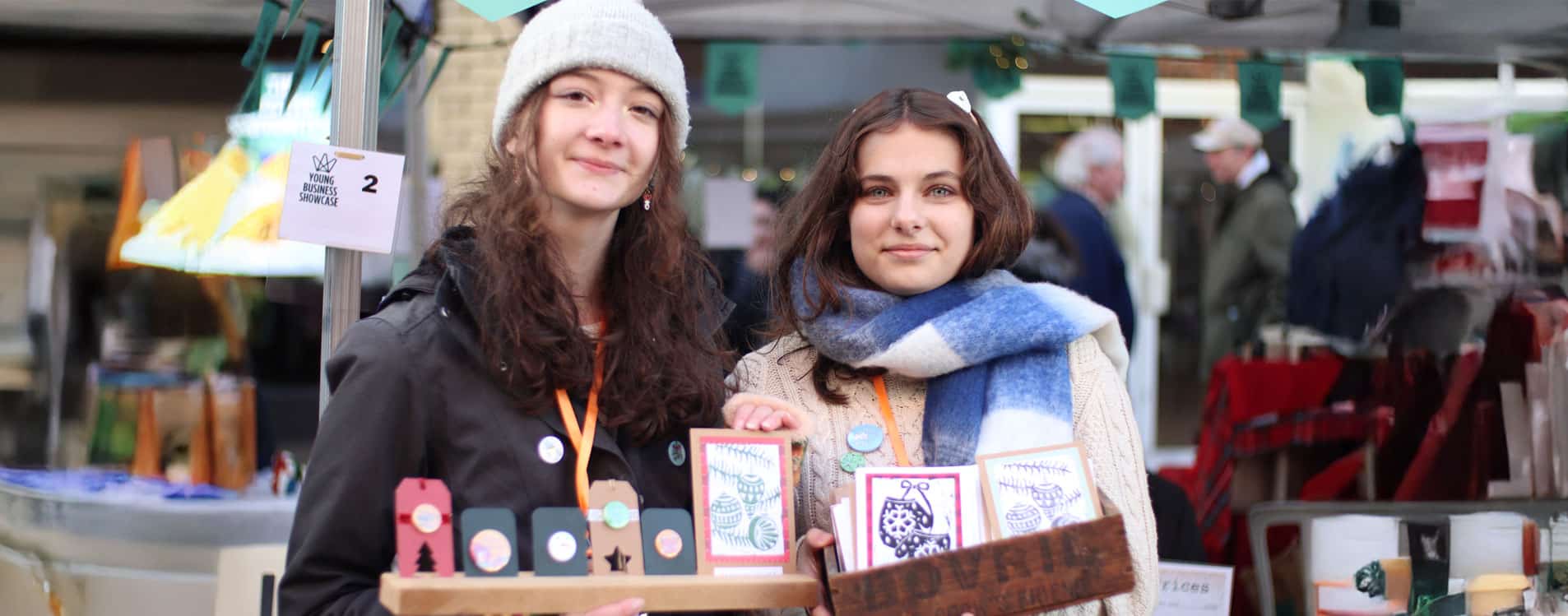 Two-young-entrepreneurs-at-the-Christmas-Young-Business-Showcase