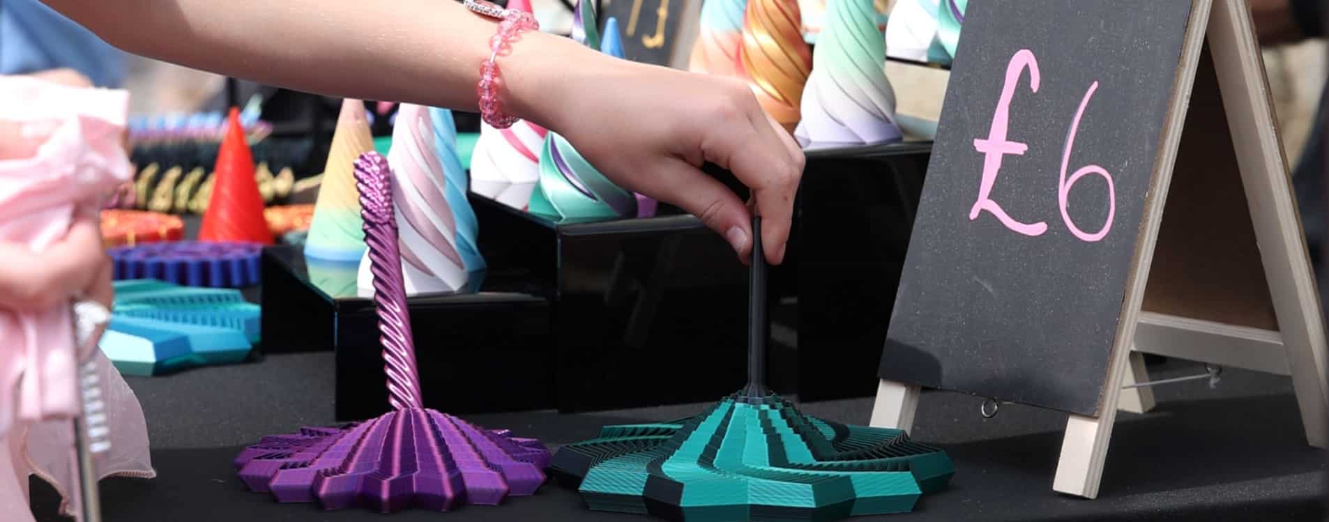 Summer_3D-printing-hand-plays-6-pounds